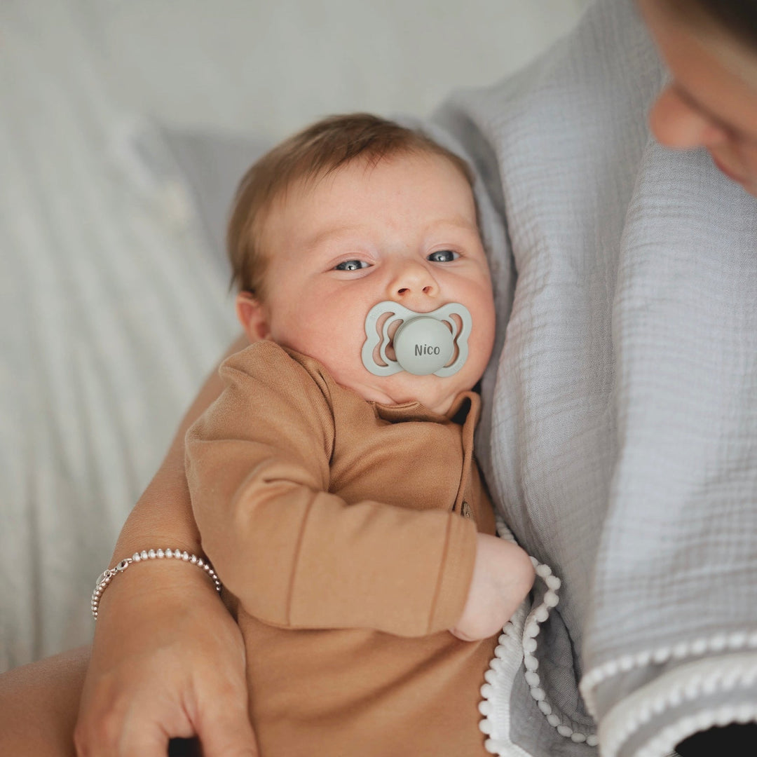 JBØRN babycadeauset | Biologische mousseline inbakerdeken & bijtring