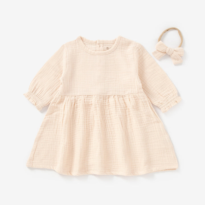 JBØRN Organic Cotton Muslin Baby Girl Dress and Bow | Personalisable in Muslin Peach Cream, sold by JBørn Baby Products Shop, Personalizable by JustBørn