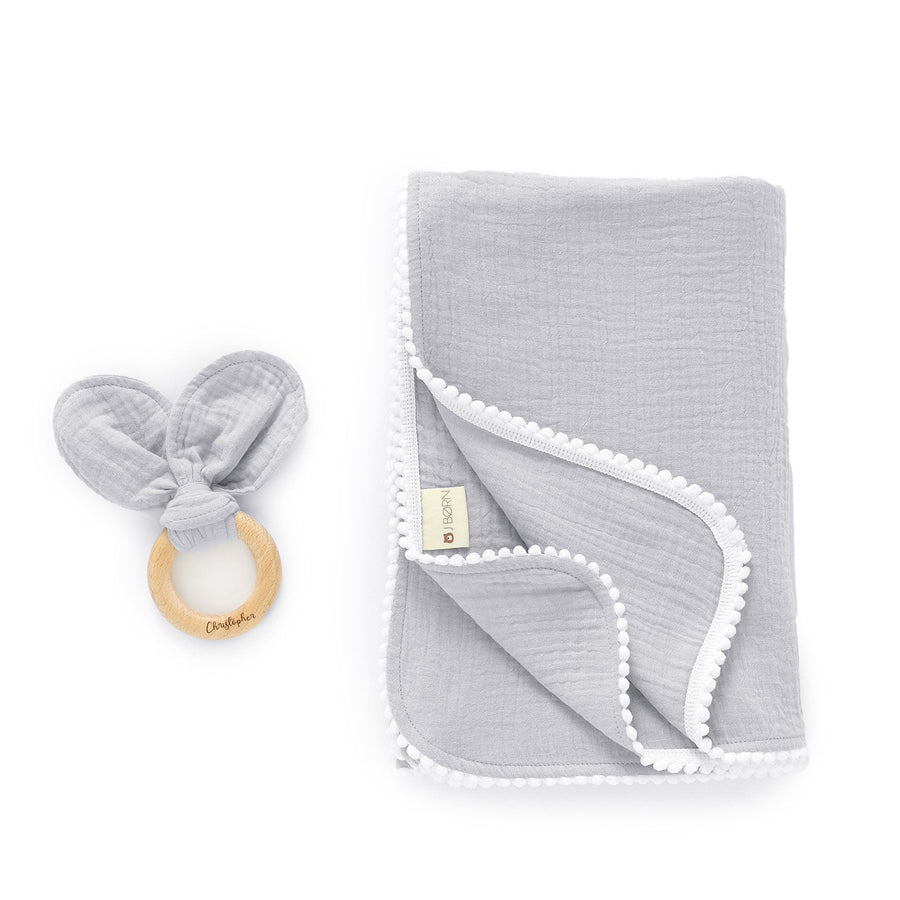 JBØRN Pop Pom Swaddle Organic Muslin Blanket & Teether Set | Personalisable in Muslin Cloud, sold by JBørn Baby Products Shop, Personalizable by JustBørn