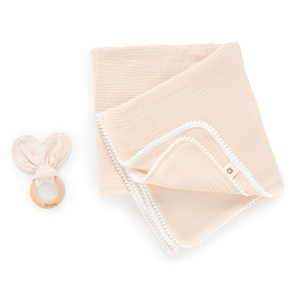 JBØRN Pop Pom Swaddle Organic Muslin Blanket & Teether Set | Personalisable in Muslin Peach Cream, sold by JBørn Baby Products Shop, Personalizable by JustBørn