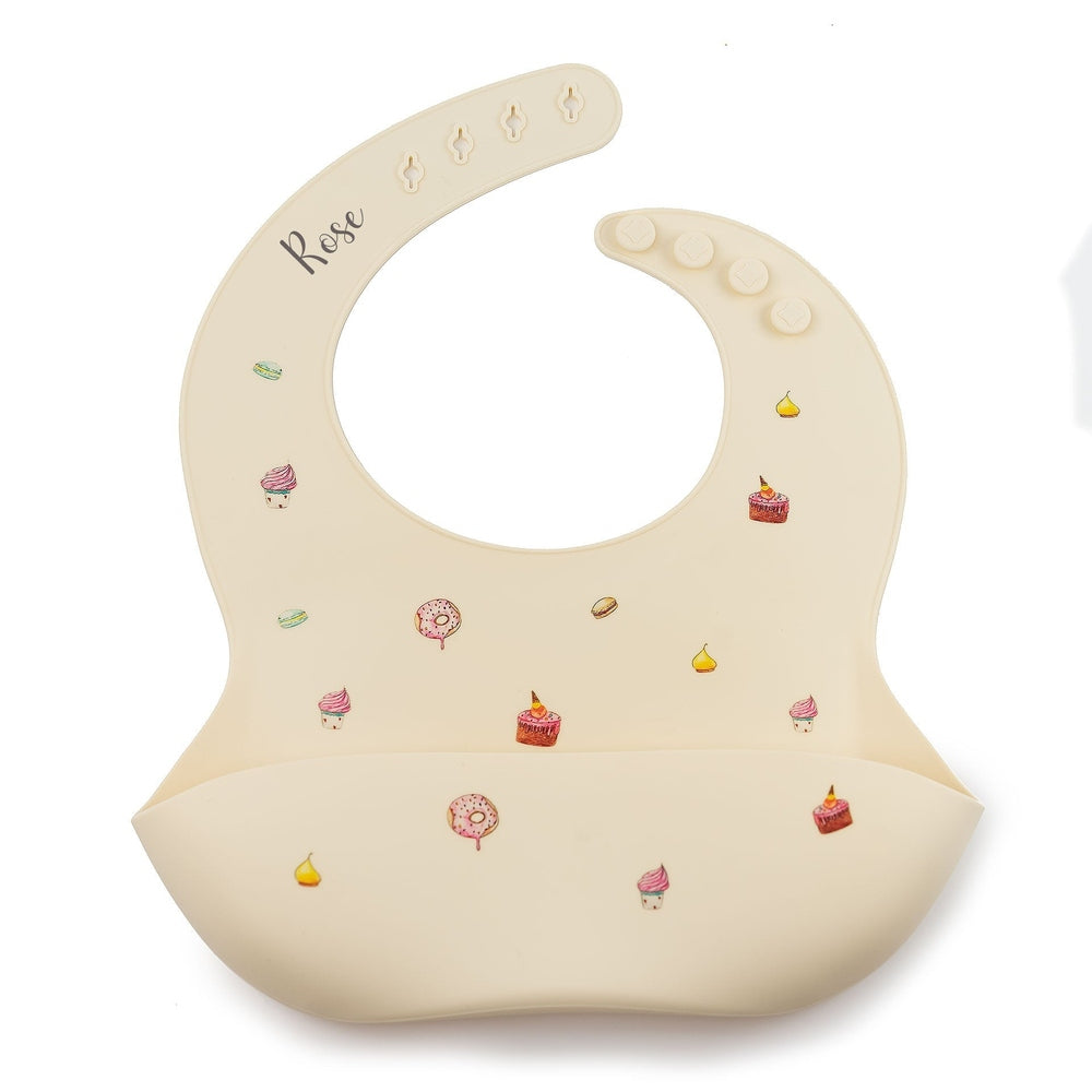JBØRN Silicone Baby Feeding Bib | Weaning Essentials | Personalisable in Cakes Ivory, sold by JBørn Baby Products Shop, Personalizable by JustBørn